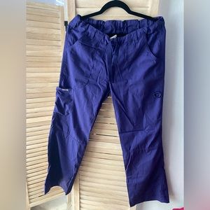 Purple Cherokee medical scrubs.